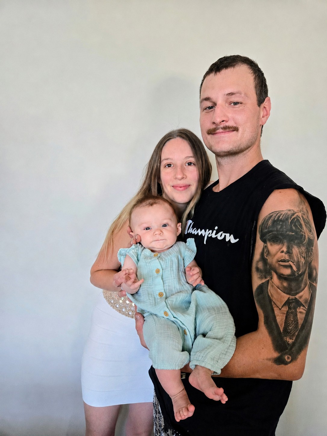Travis and Annica with their baby